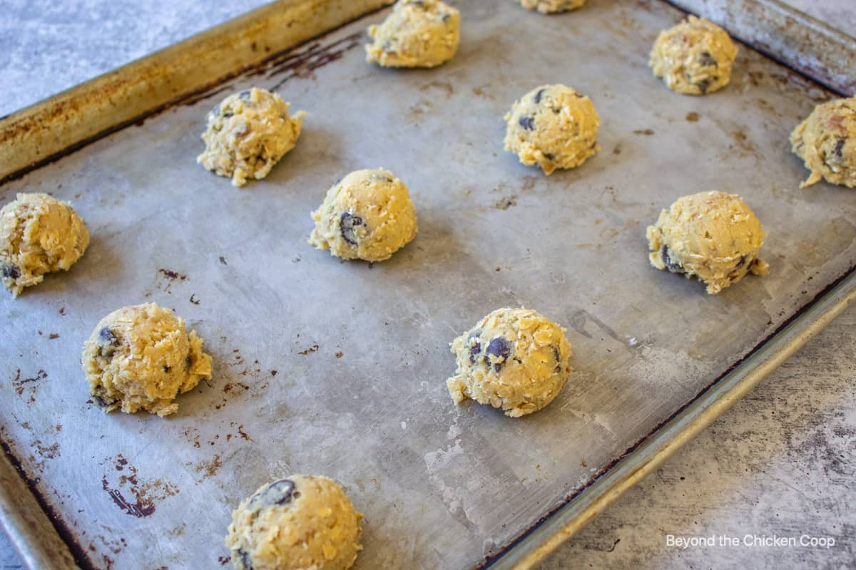 Cookie dough on a baking sheet.