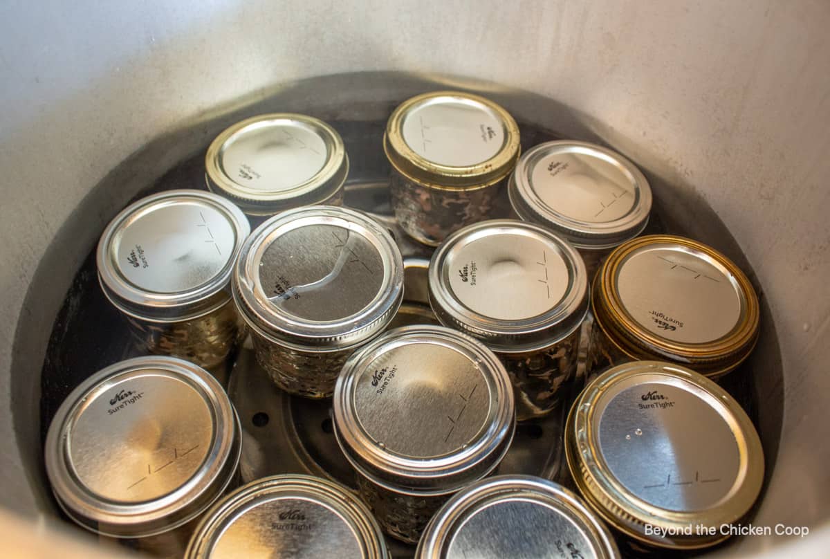 Canning jars in a pressure cooker.