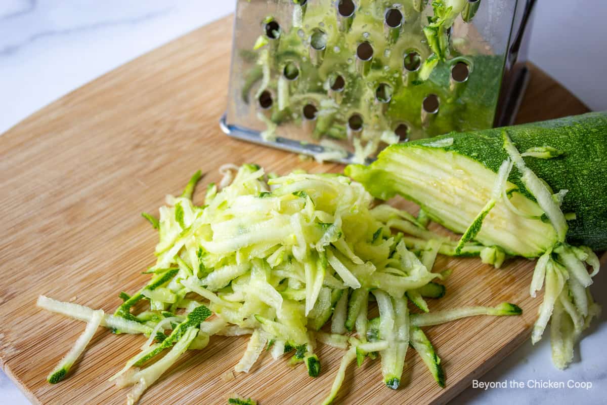 Grated zucchini with a box grater.