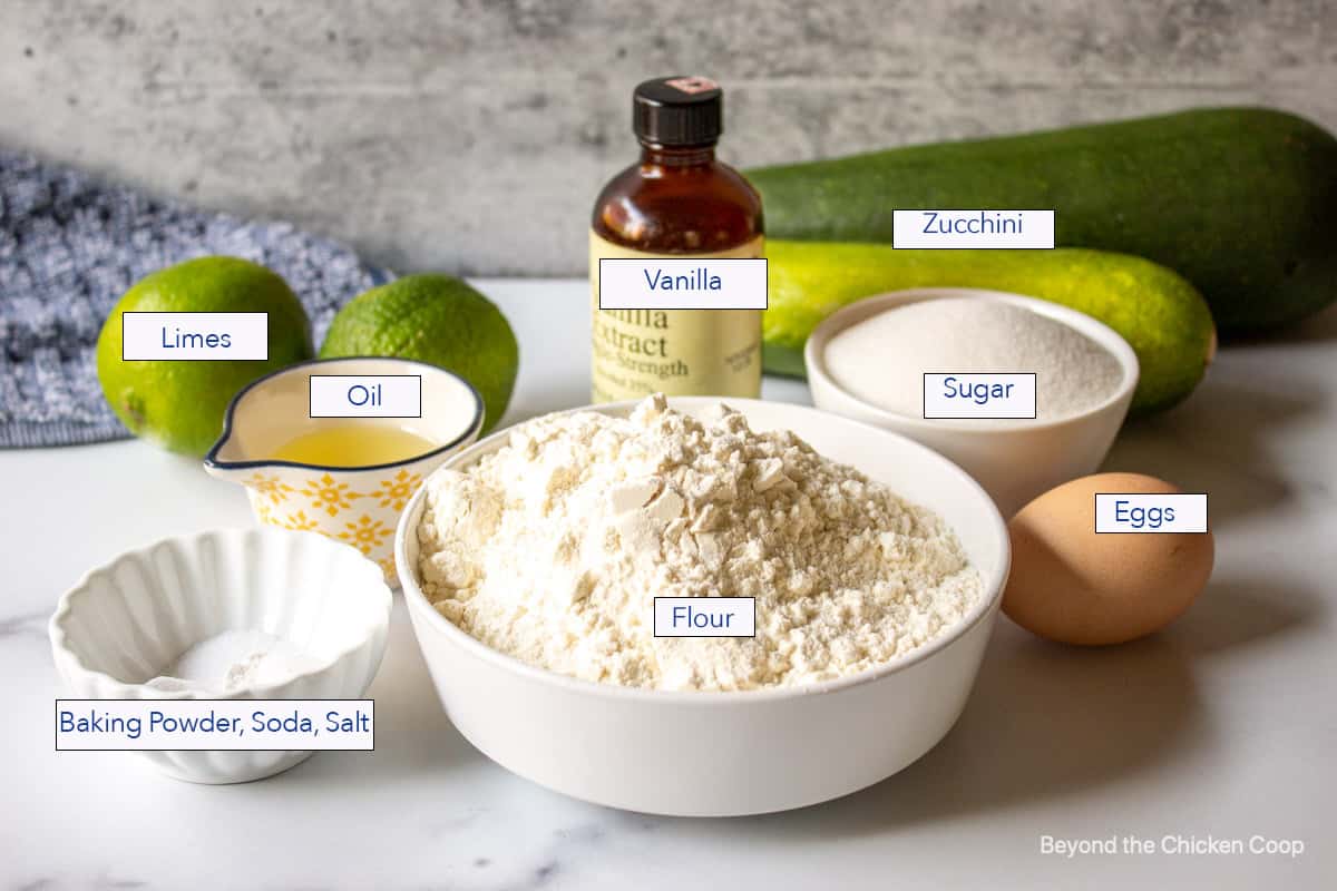 Ingredients for making zucchini bread with lime glaze.