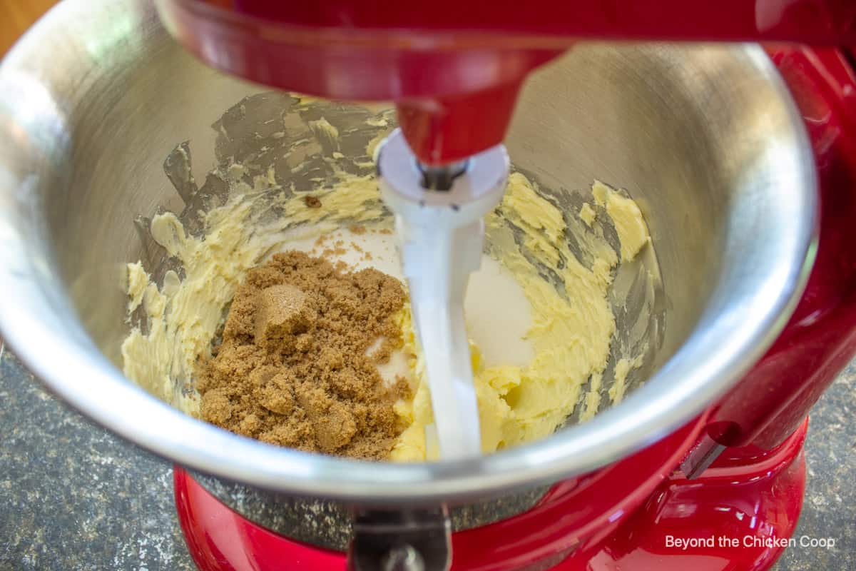 Butter and sugar in a mixing bowl.