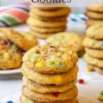 A stack of cookies filled with candy pieces.