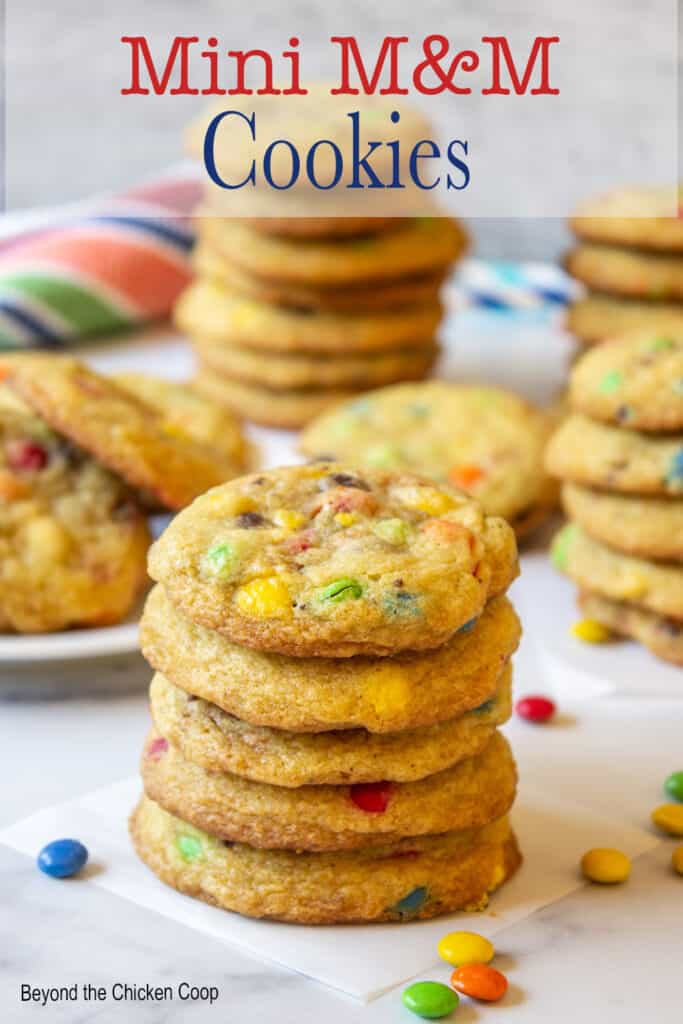A stack of cookies filled with candy pieces.