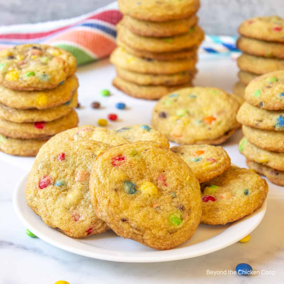 A plateful of cookies with candy pieces.