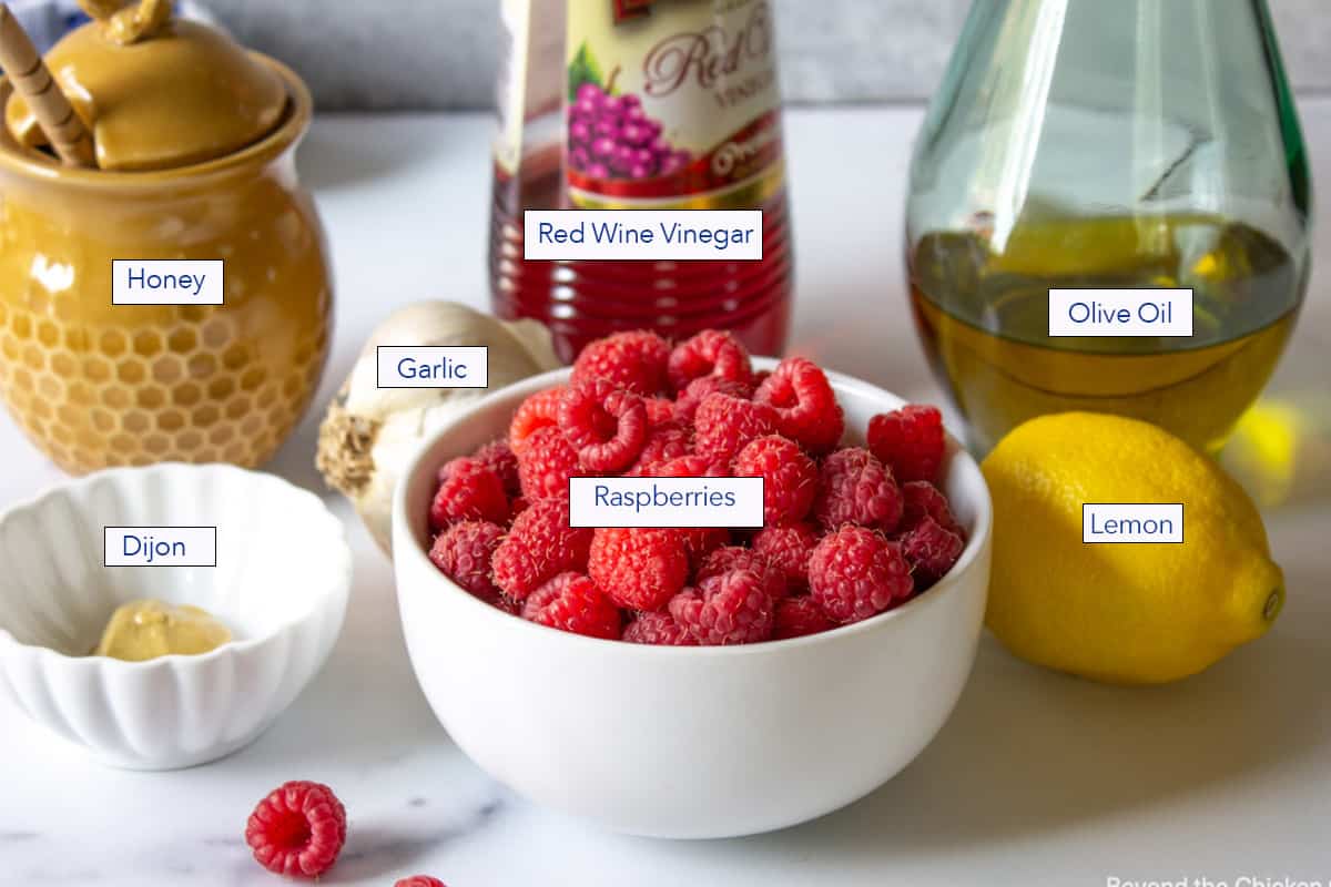 Ingredients for making a raspberry dressing.