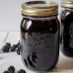 A canning jar filled with homemade jam.