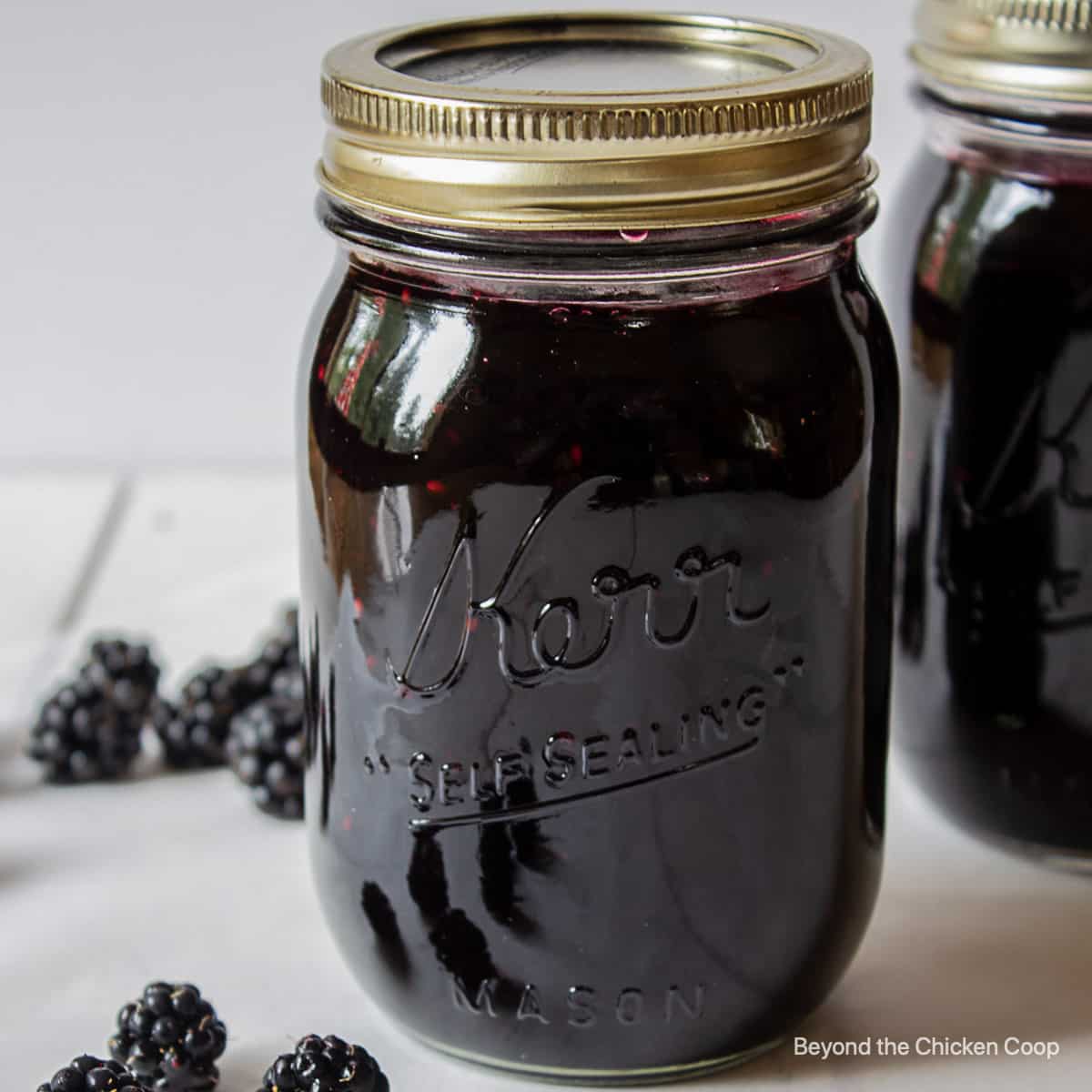 A canning jar filled with homemade jam.