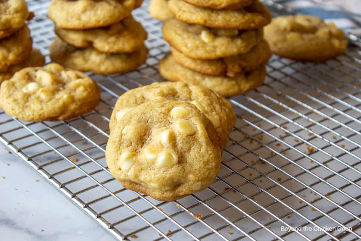 A stack of cookies on a baking rack.