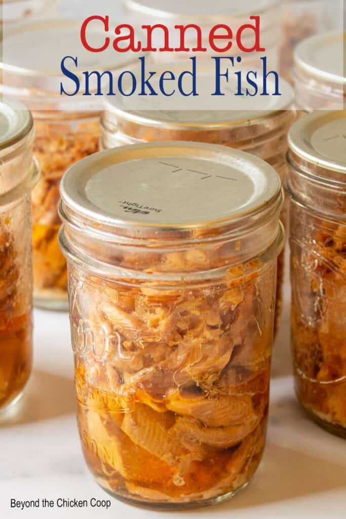 A canning jar filled with smoked fish.