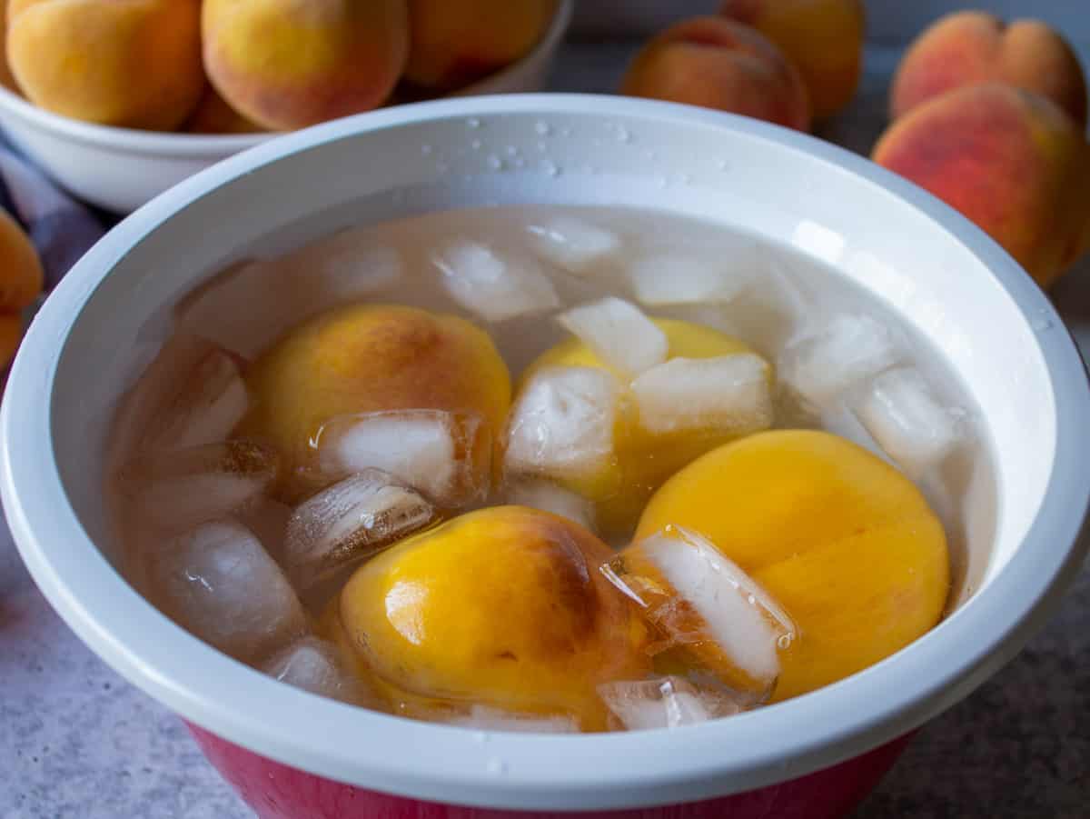 Peaches in a water bath.