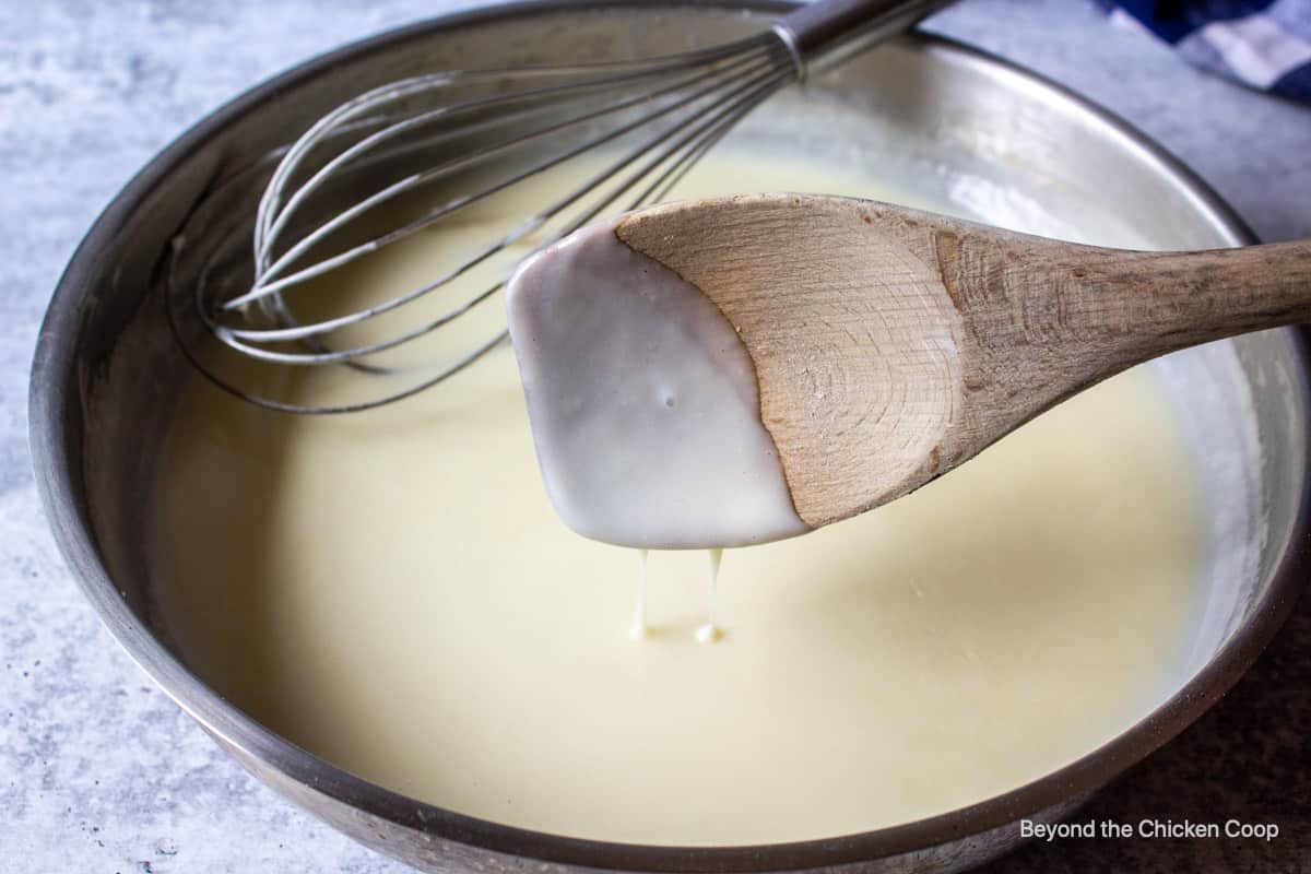 A thickened white sauce in a pan.