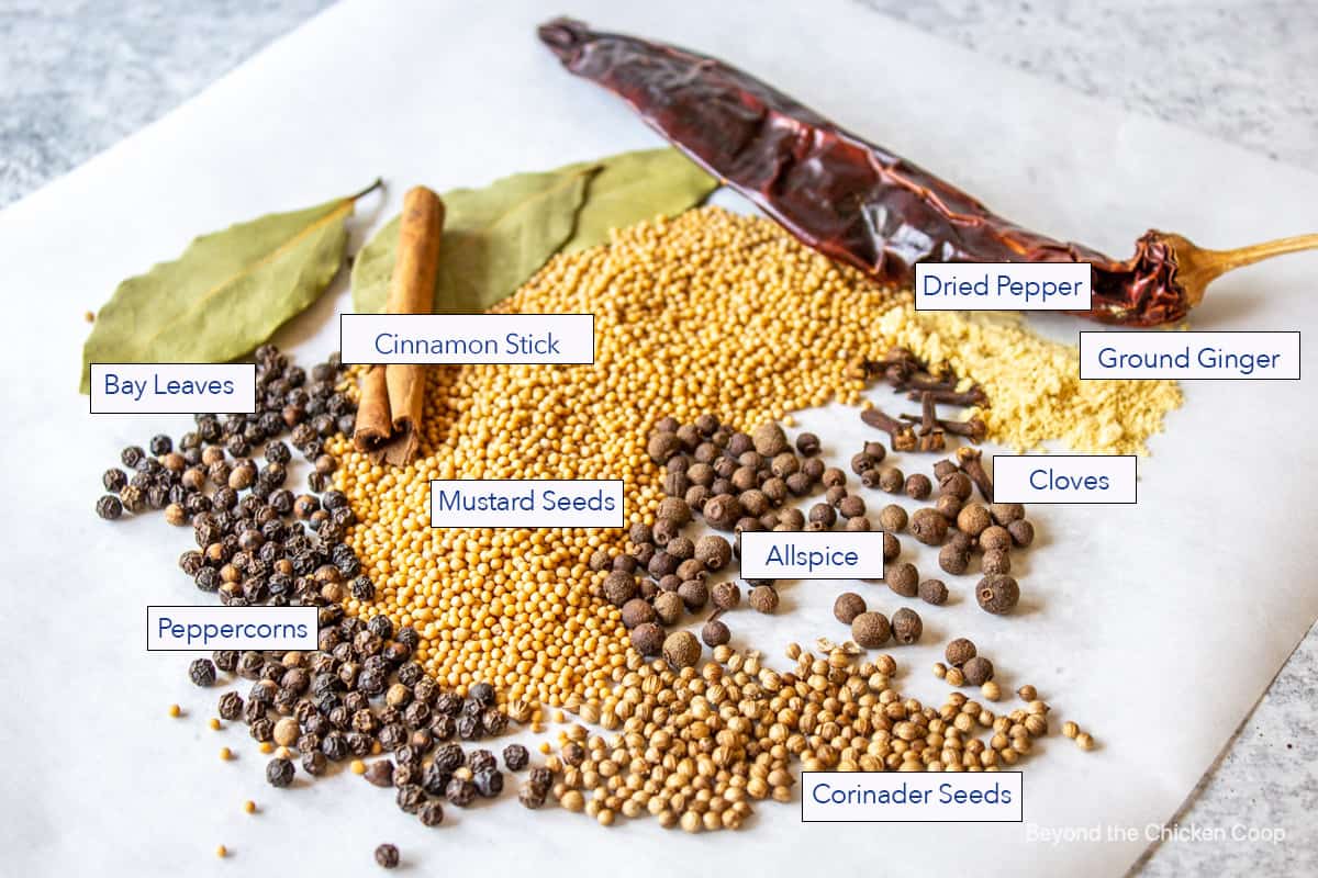 Spices and seeds on a board.