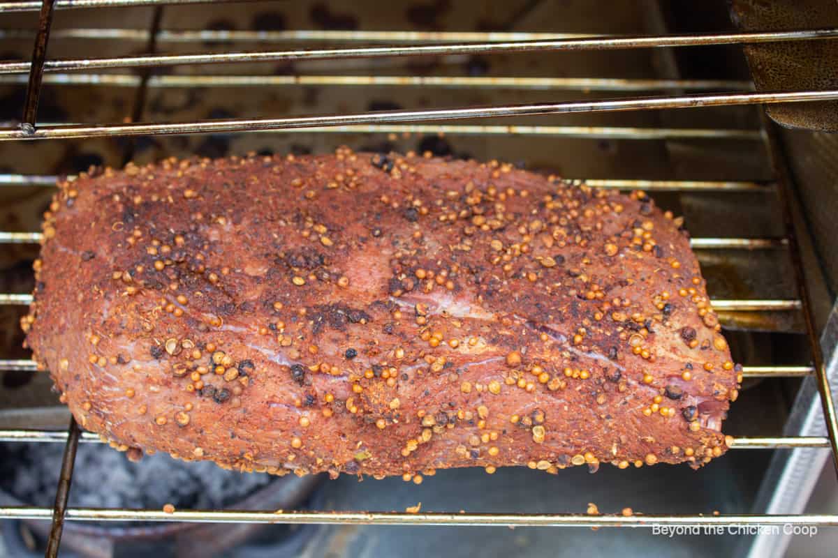 Venison roast smoked in a smoker.