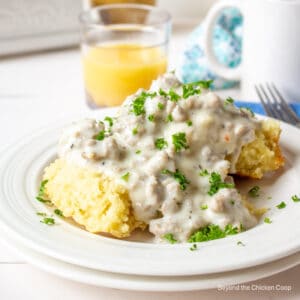 Cut biscuits topped with sausage gravy.