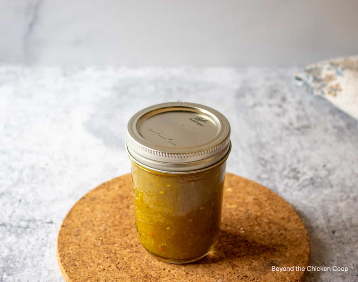 A canning jar filled with relish.