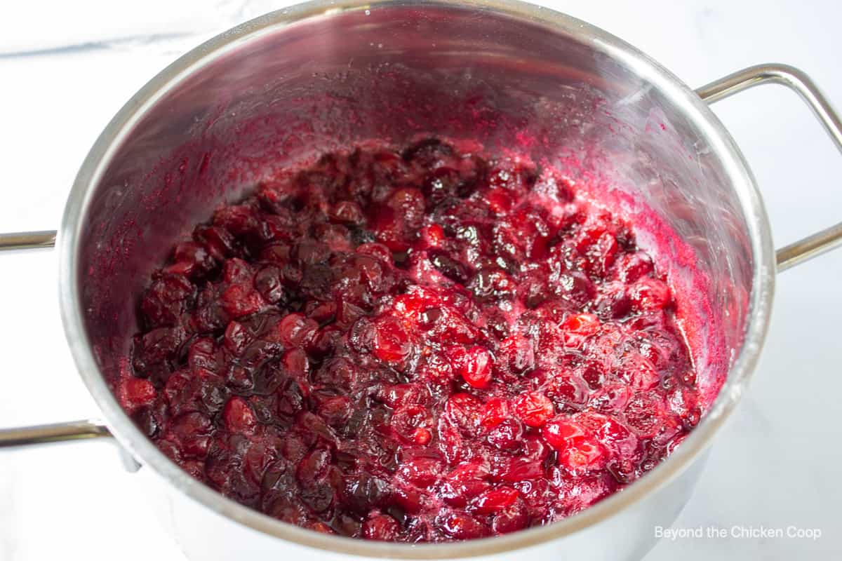 Cooked cranberries in a pot.