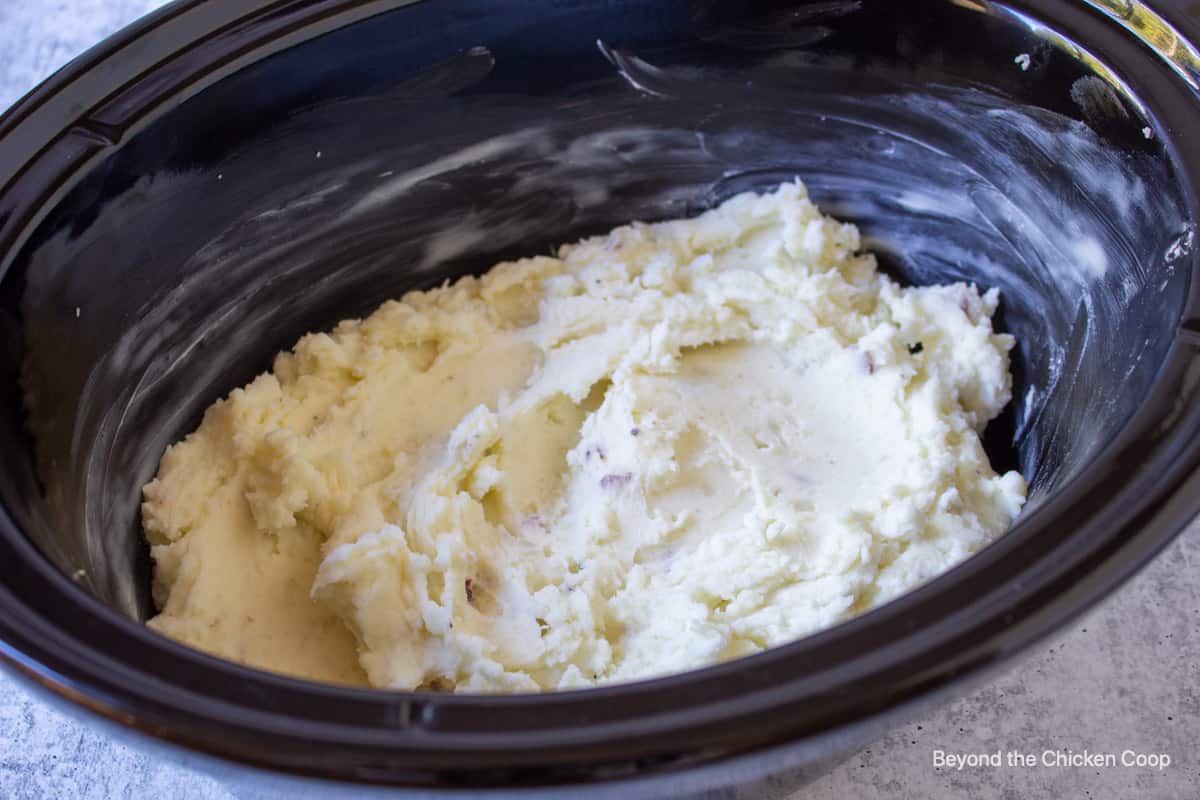 Cooked potatoes in a slow cooker.