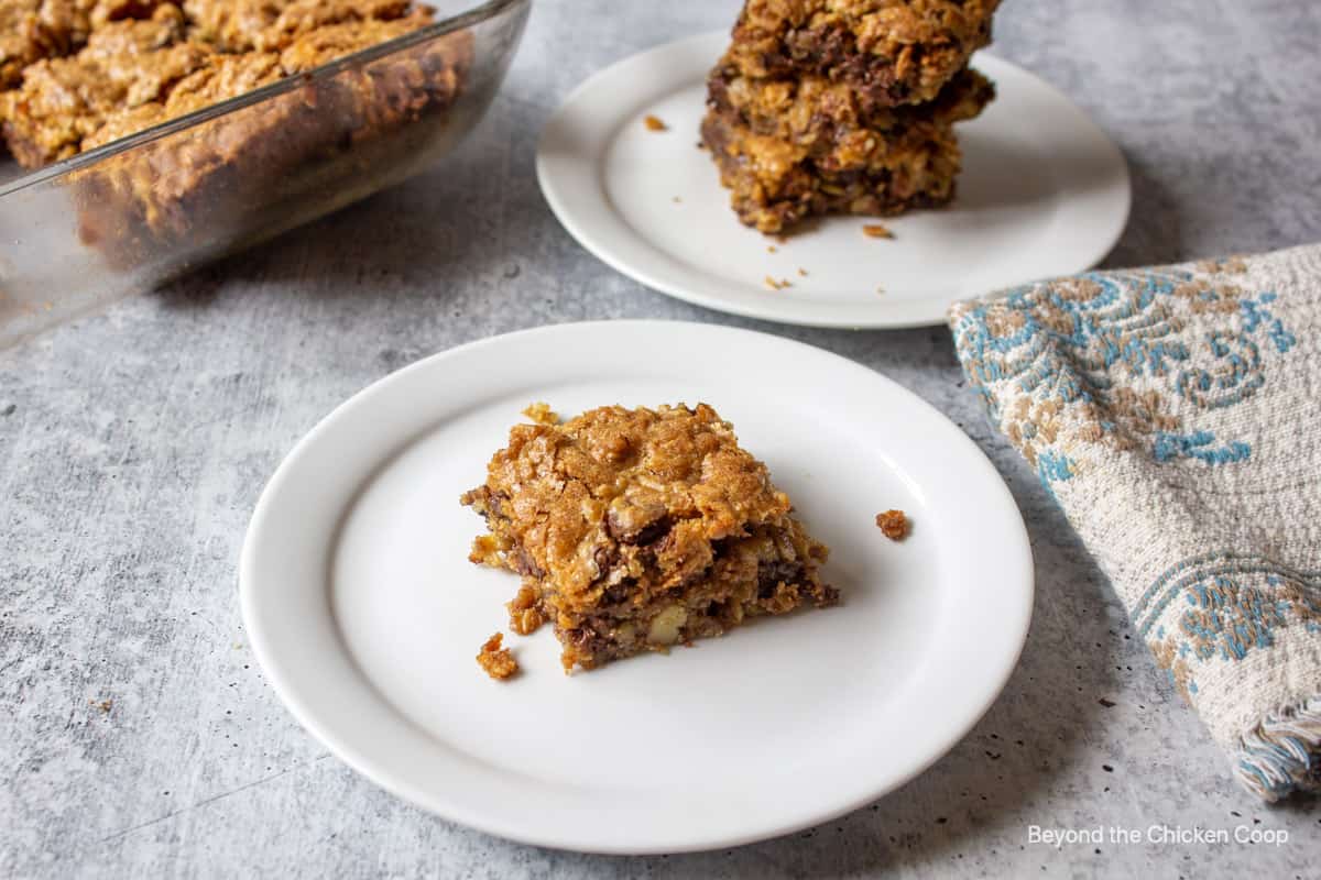 Oatmeal chocolate chip bar on a white plate.