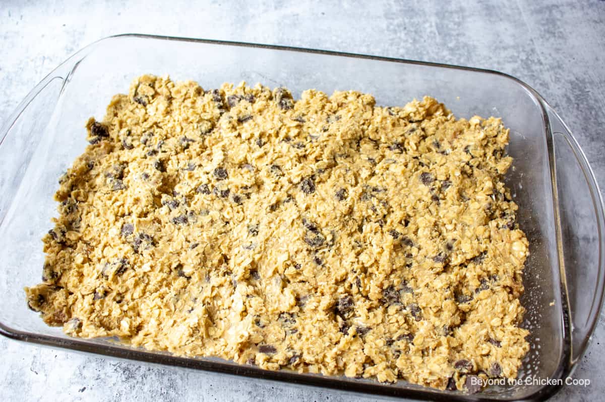 Cookie bar dough in a baking dish.