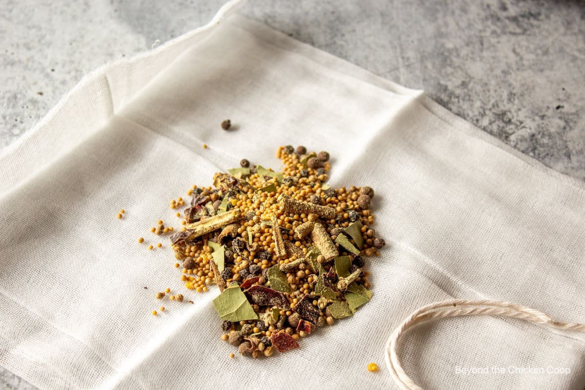 Pickling spices on cheesecloth.