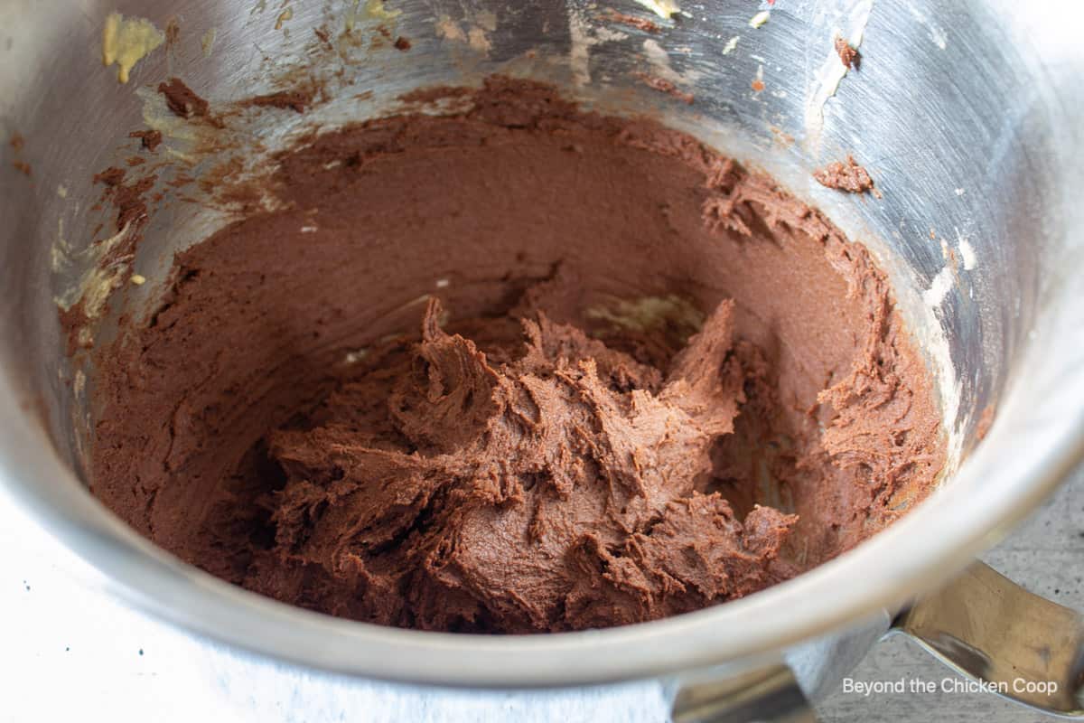 Chocolate cookie dough in a mixing bowl.