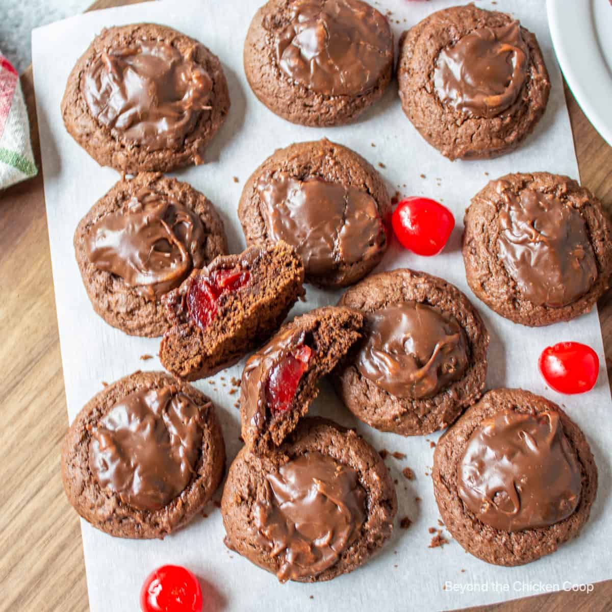 Chocolate cookies with a cherry in the center.