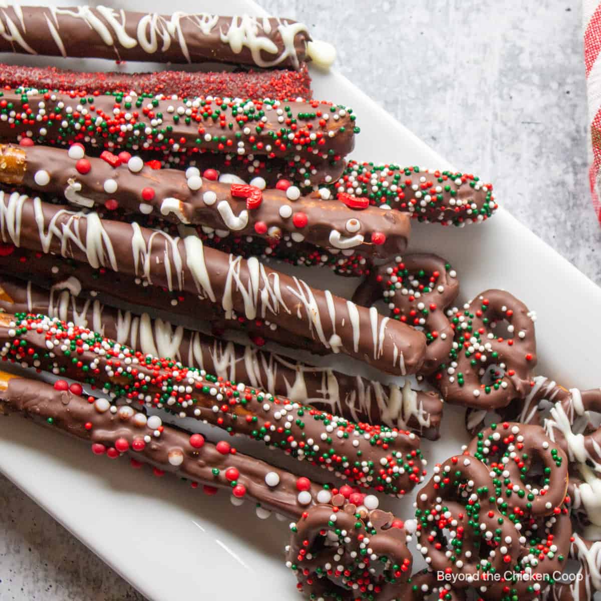 Pretzels with chocolate and sprinkles.