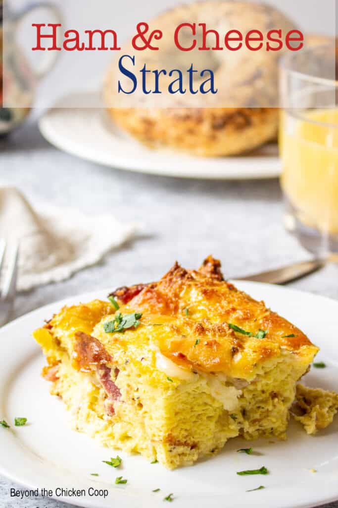 A slice of egg casserole with bits of ham.
