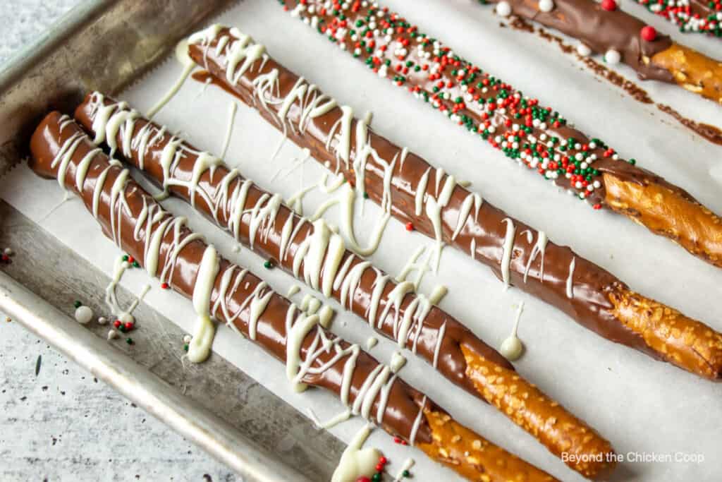 White chocolate drizzled over a pretzel.