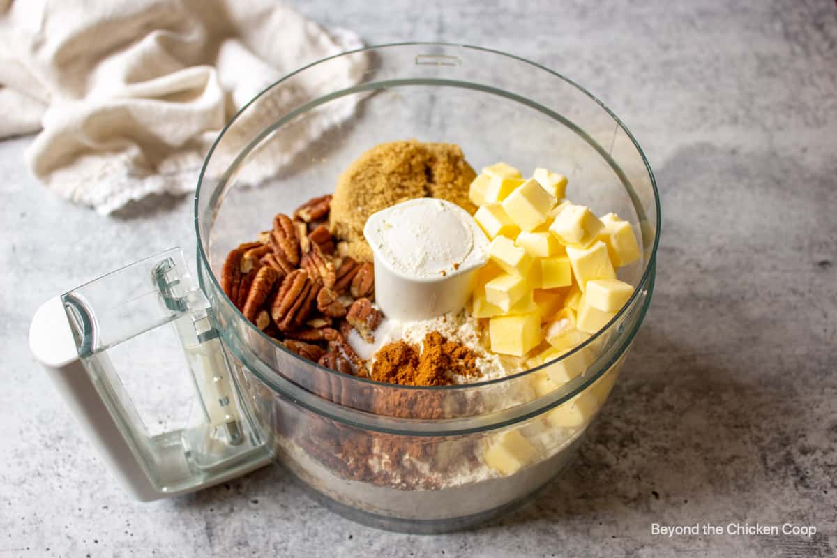 Ingredients in food processor bowl.