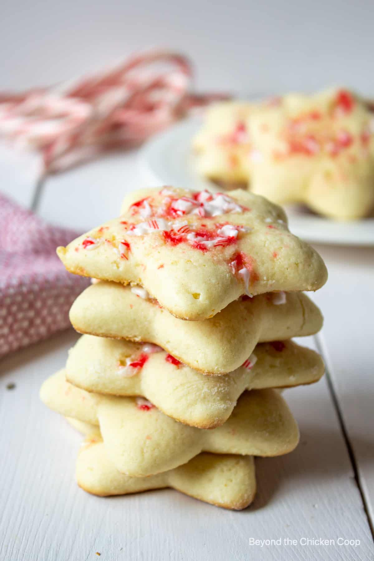 A stack of star shaped sugar cookies.