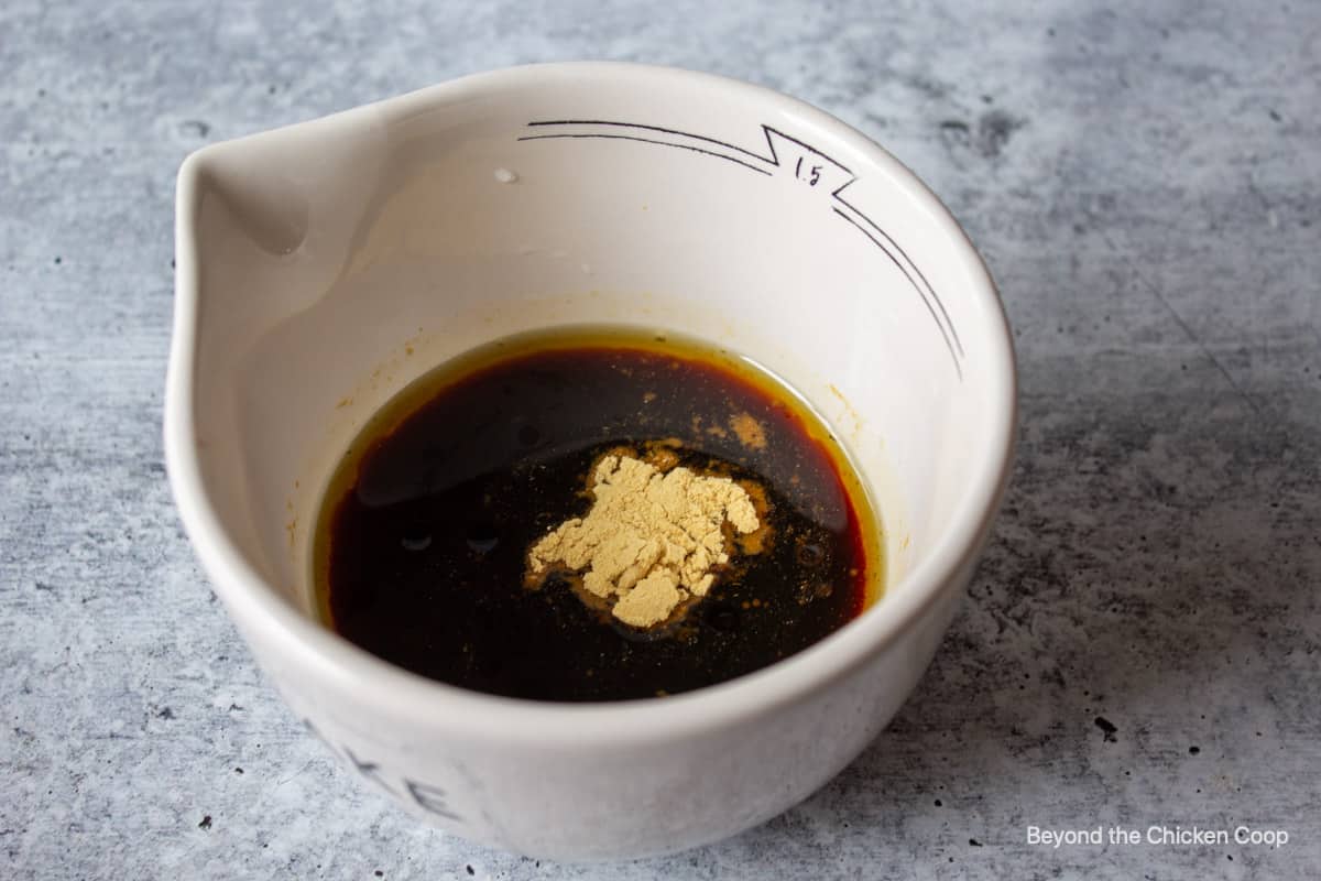 Making a sauce in large measuring cup.