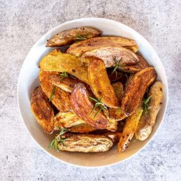 A bowlful of roasted potatoes.