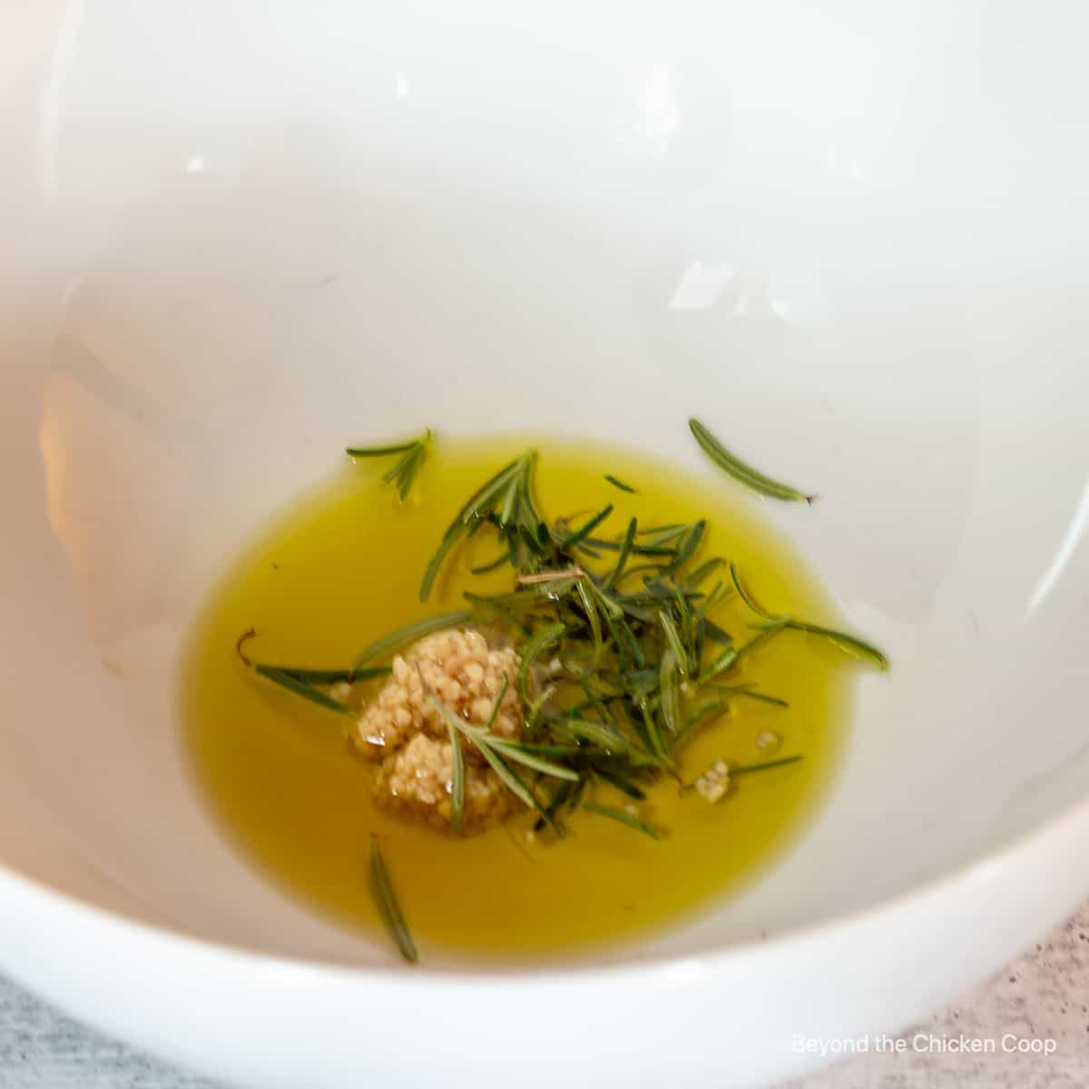 Olive oil with rosemary and garlic.