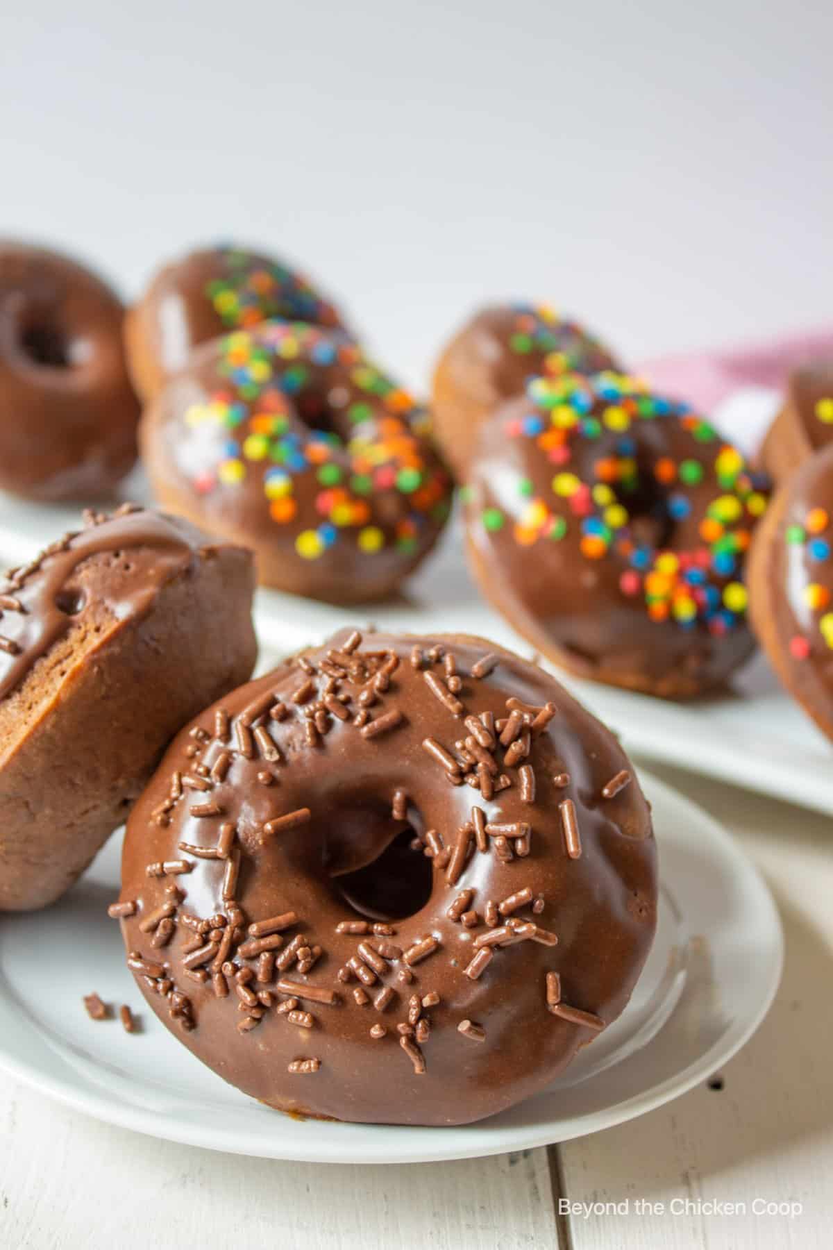 Baked donut with glaze and chocolate sprinkles. 