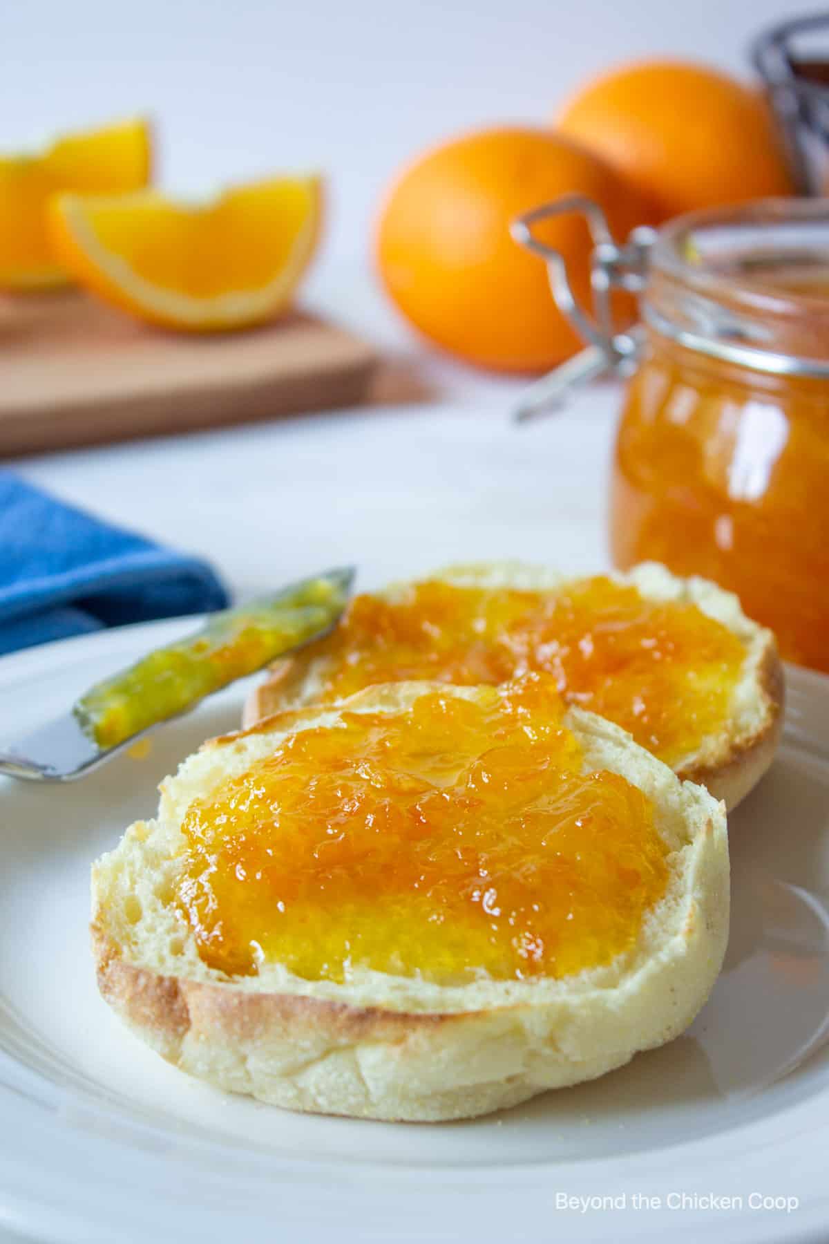 English muffins topped with orange jam.