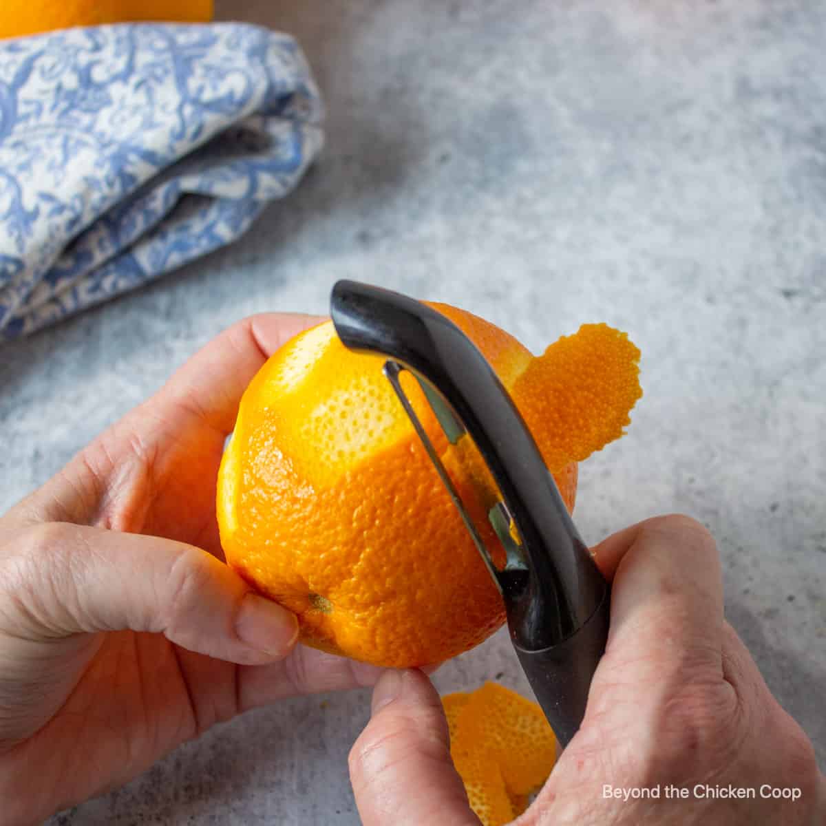 Peeling an orange.