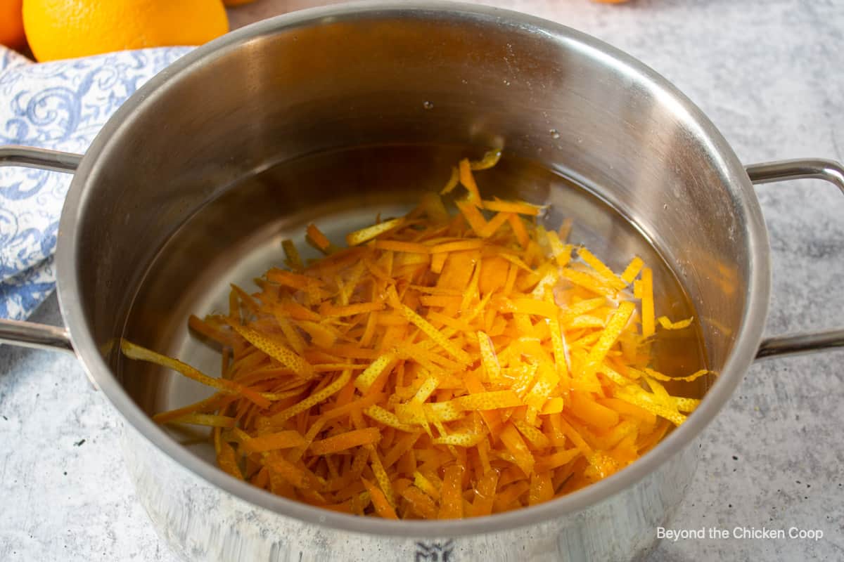 Orange peel in a saucepan.