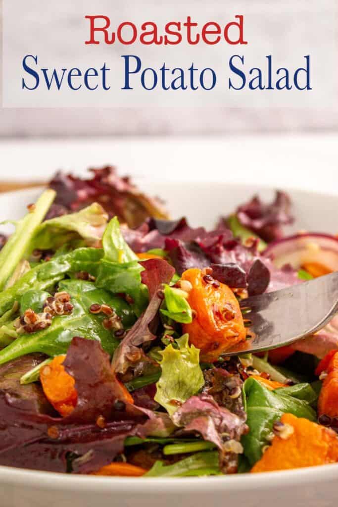 A green salad with sweet potatoes and quinoa.