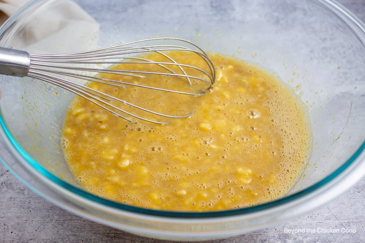 Batter mixed in a galss bowl.