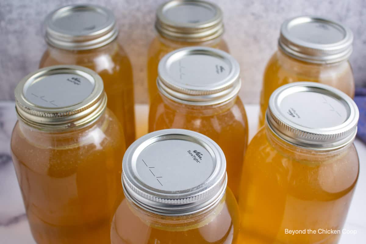 Jars of canned chicken stock. 