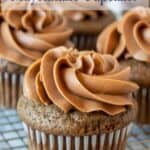 A baking rack filled with chocolate cupcakes.