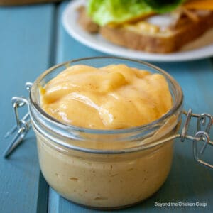 Miracle Whip in a small glass jar.