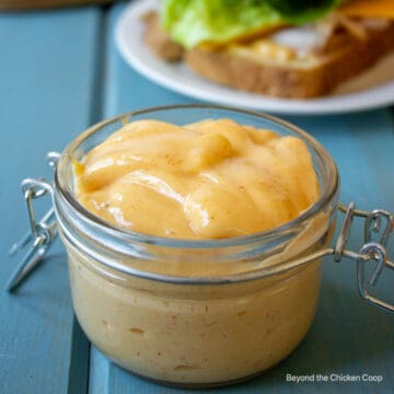 Miracle Whip in a small glass jar.