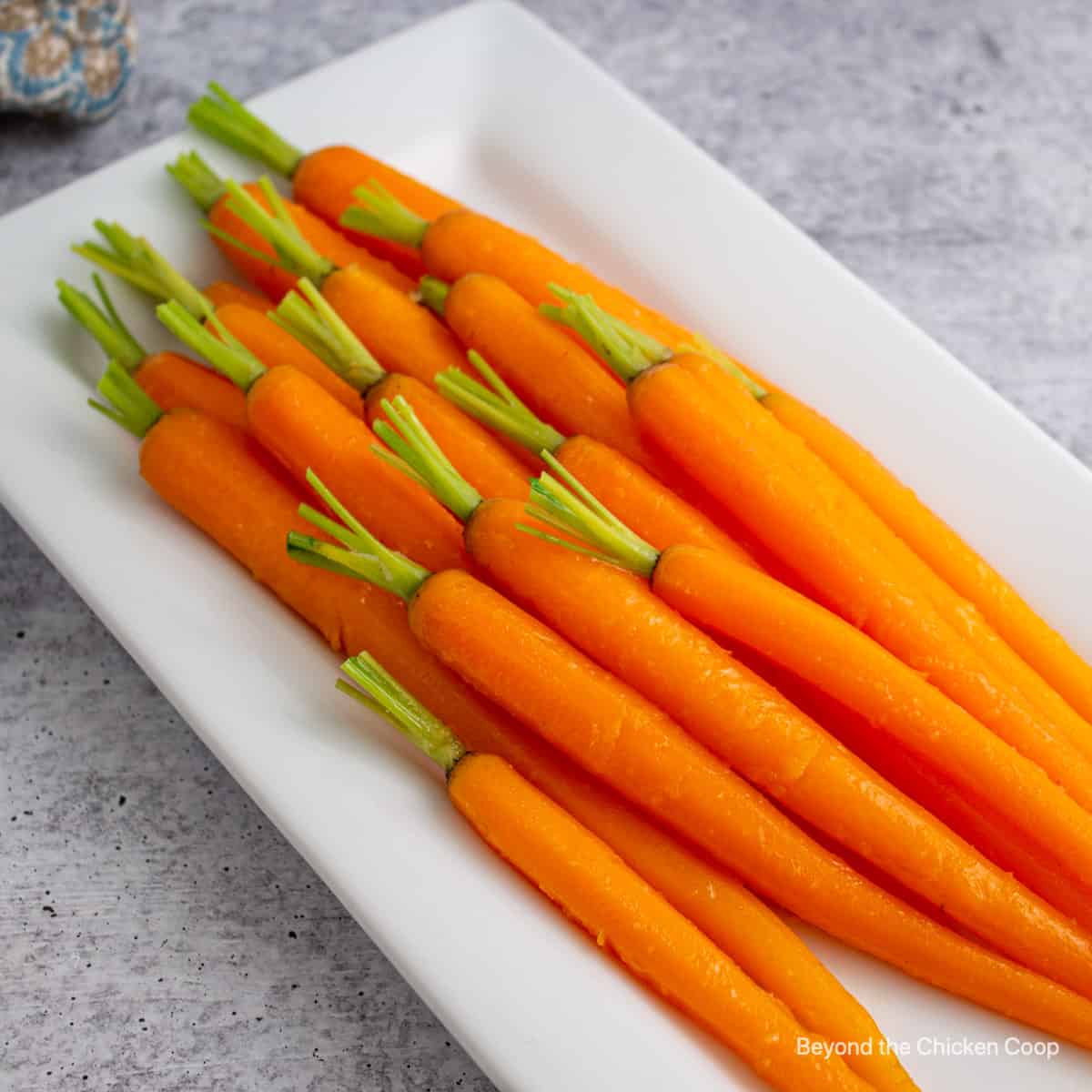 Honey ginger carrots with little green stems. 