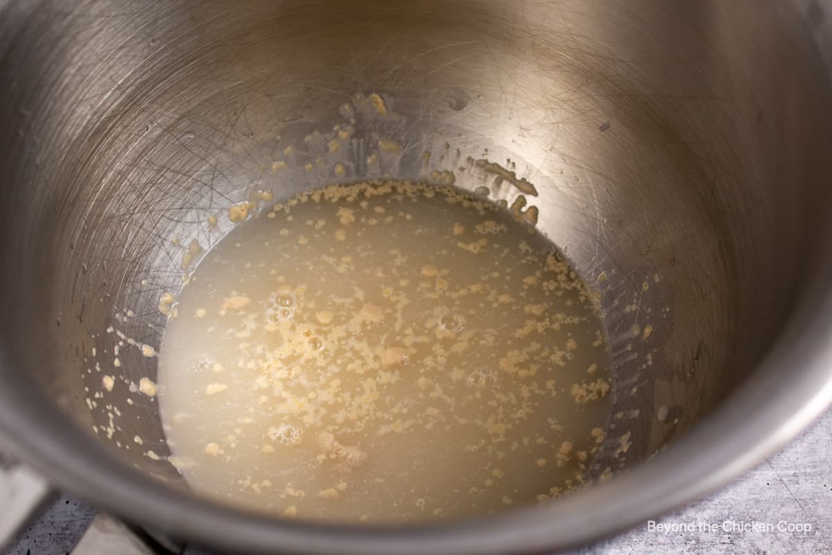 Proofing yeast in a mixing bowl.