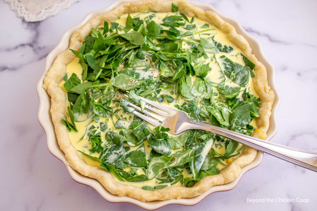 Egg mixture with spinach in a pie crust. 