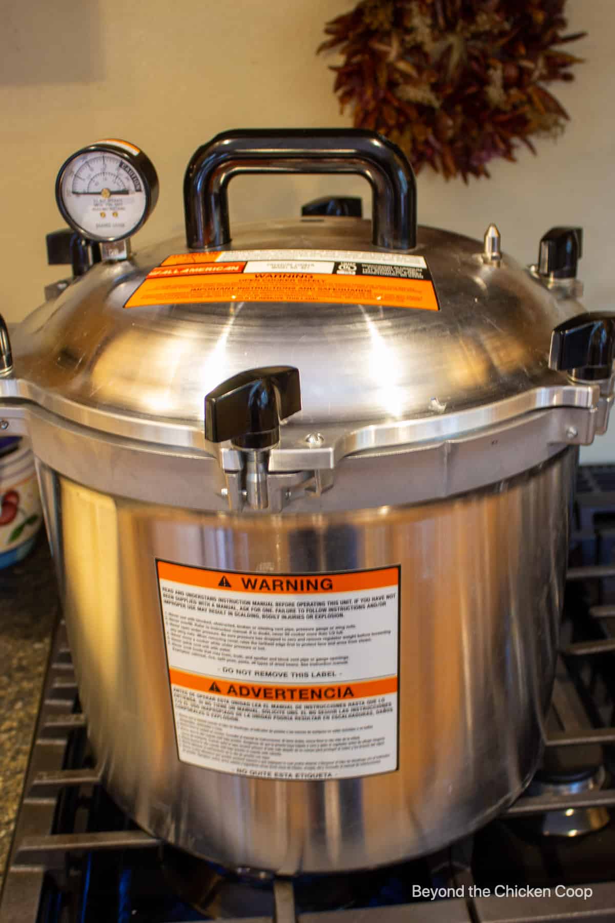 A pressure canner with the lid in place.