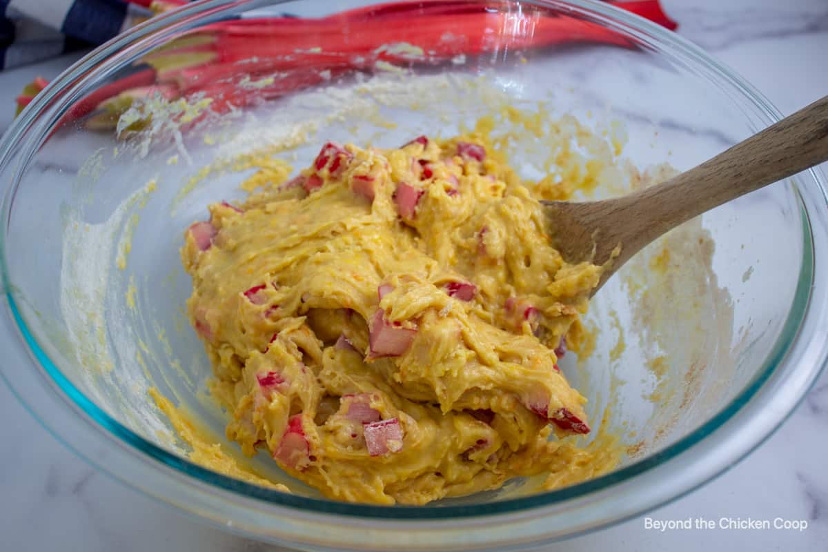 Mixing bread batter in a bowl.