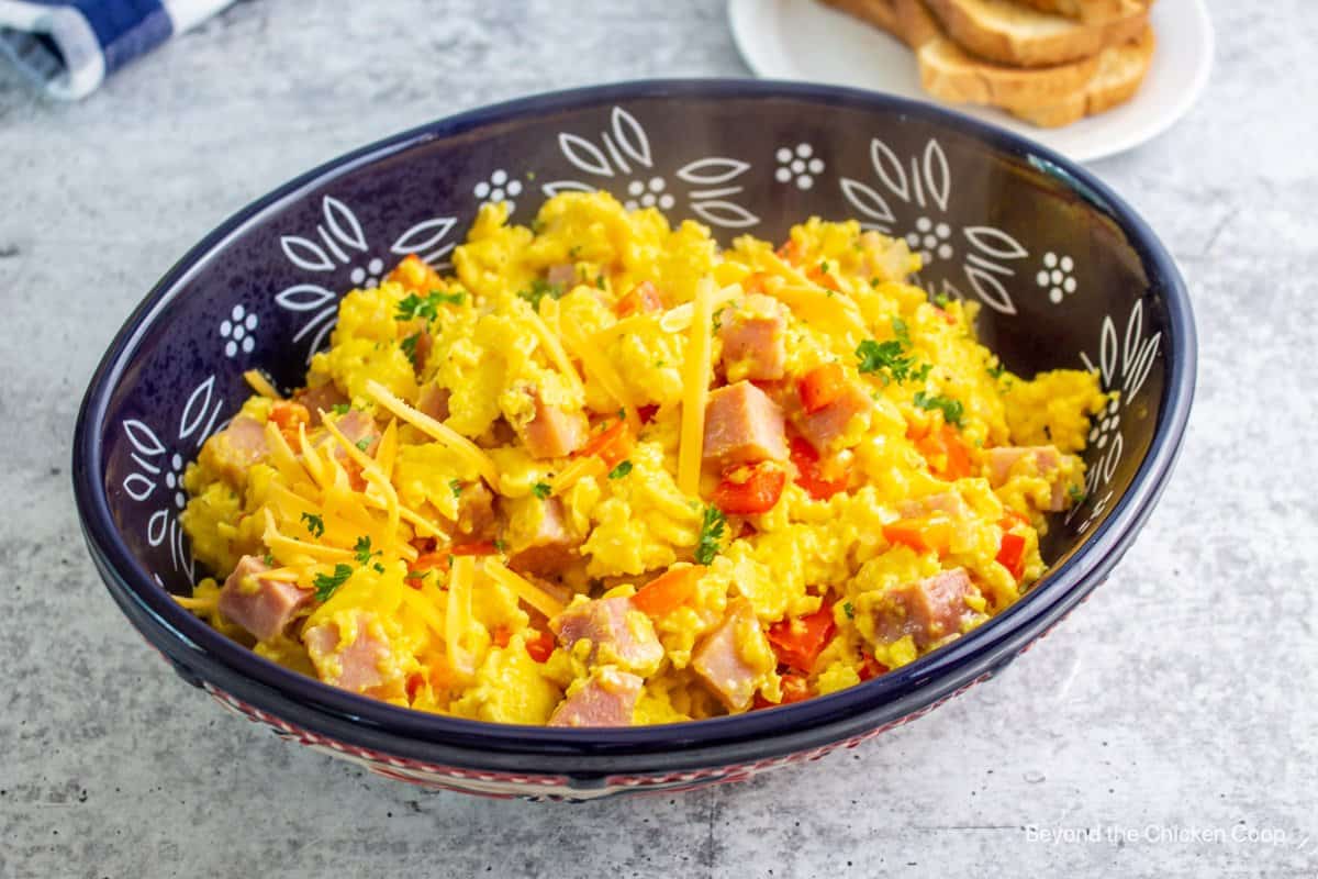 Scrambled eggs with bell peppers, ham and cheese.